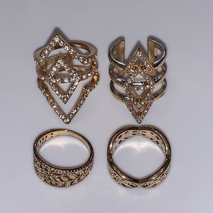Four gold tone rings size 7